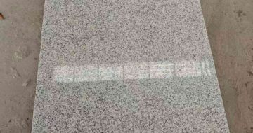 贺州芝麻白光面毛板